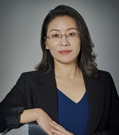 周立志女士 Ms. Caroline Zhou
